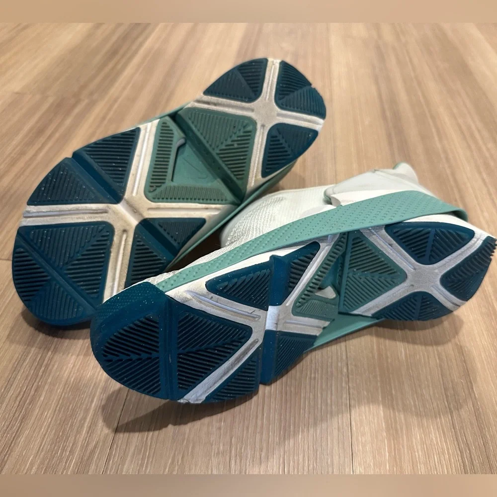 Nike Women’s Slip-On Sneakers in White and Teal